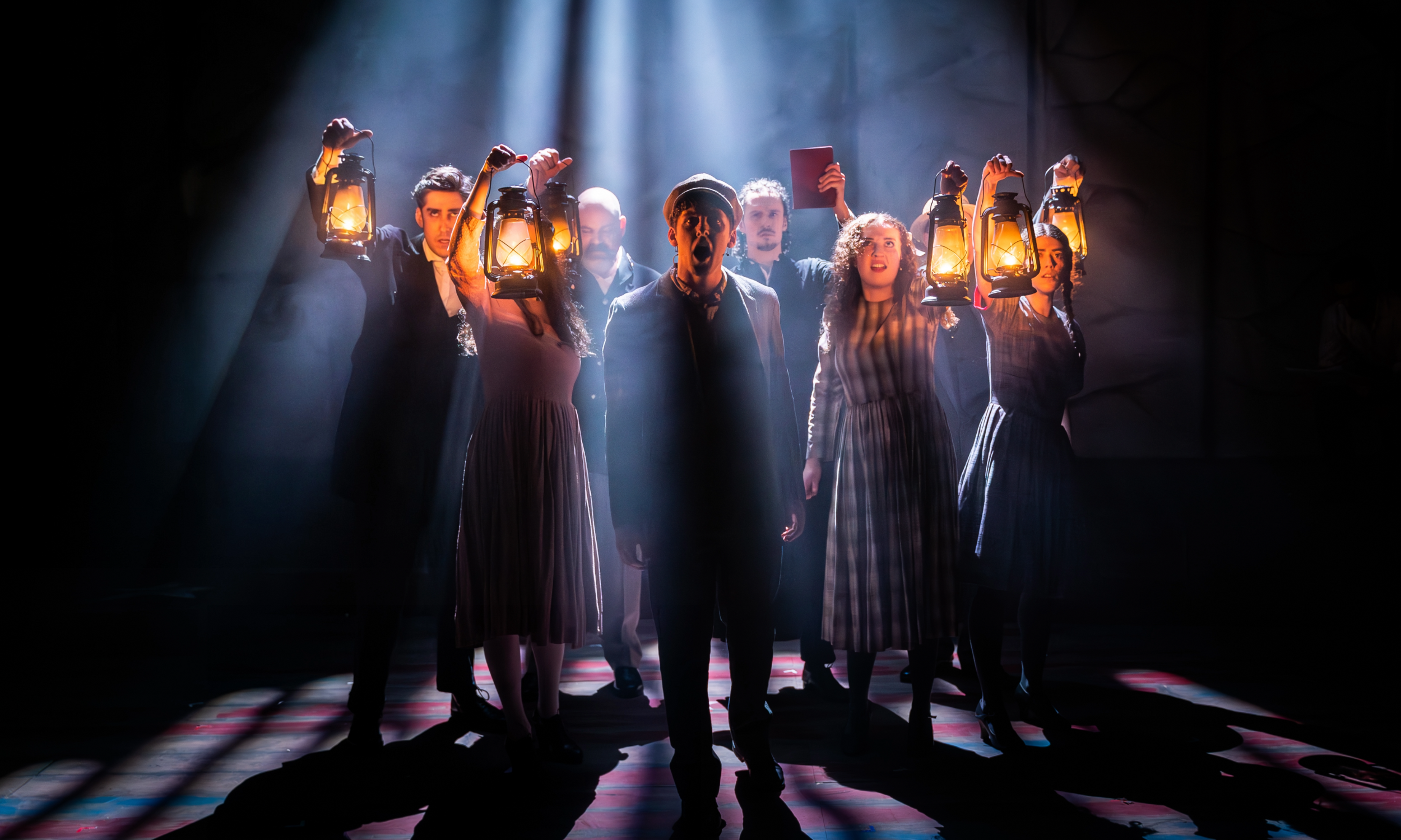 Promotional image that features the cast of the Tony Award-winning musical, Parade