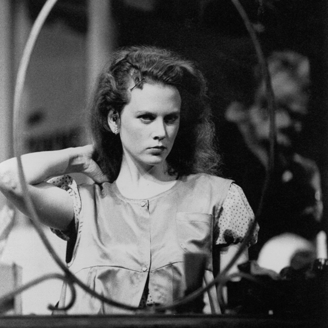 Black and white archival image of an actor looking at the camera in Steel Magnolias 1988.