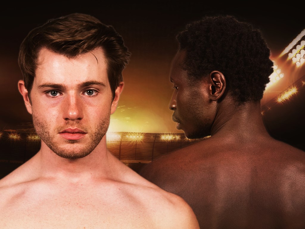 Image for the Australian premiere of The Pass at Seymour Centre, Sydney. Image shows two men standing in an otherwise-empty football stadium. They are shirtless and muscular. One of the men directly faces the camera, while the other man stands to his left behind him, with his back to the camera.