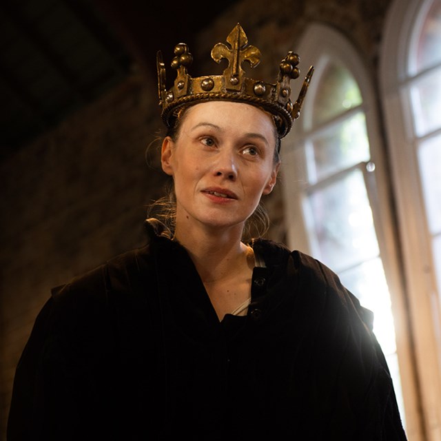 Promotional image of Richard III for Seymour Centres Arts Education Program depicting a woman wearing a crown looking past the camera/