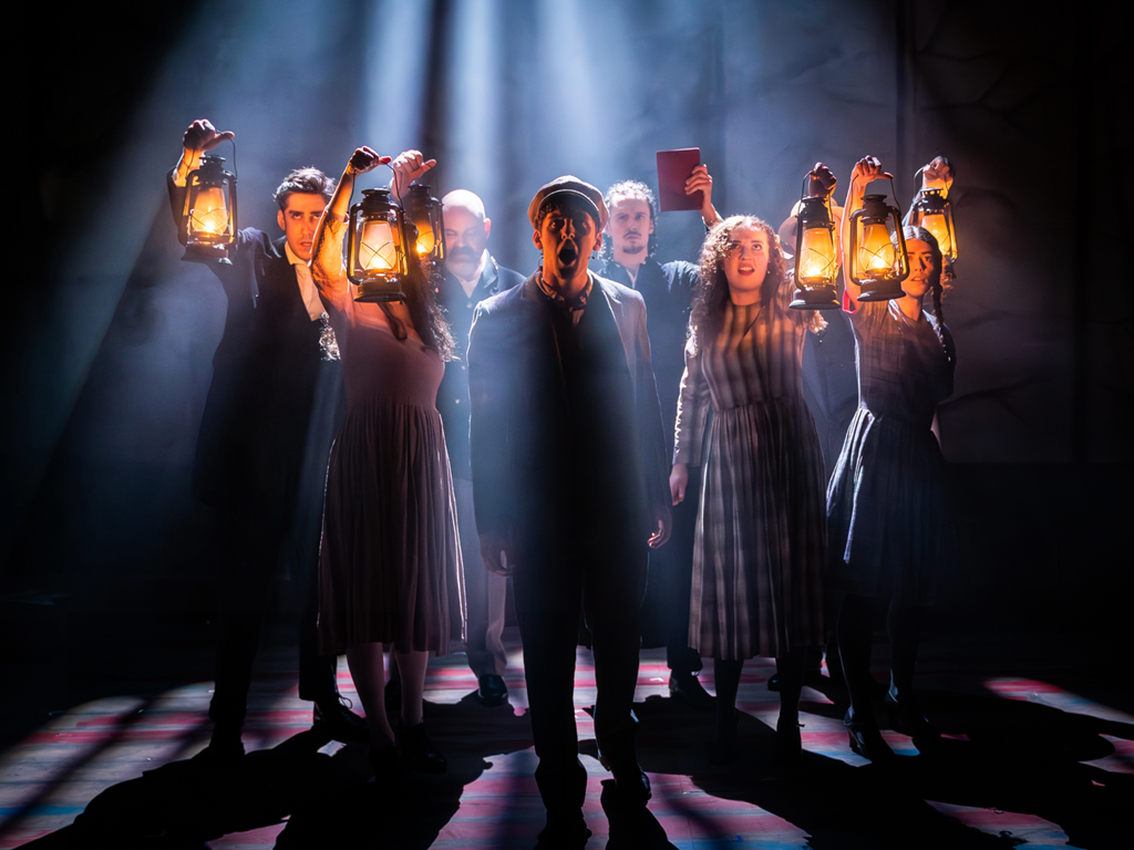 Promotional image that features the cast of the Tony Award-winning musical, Parade