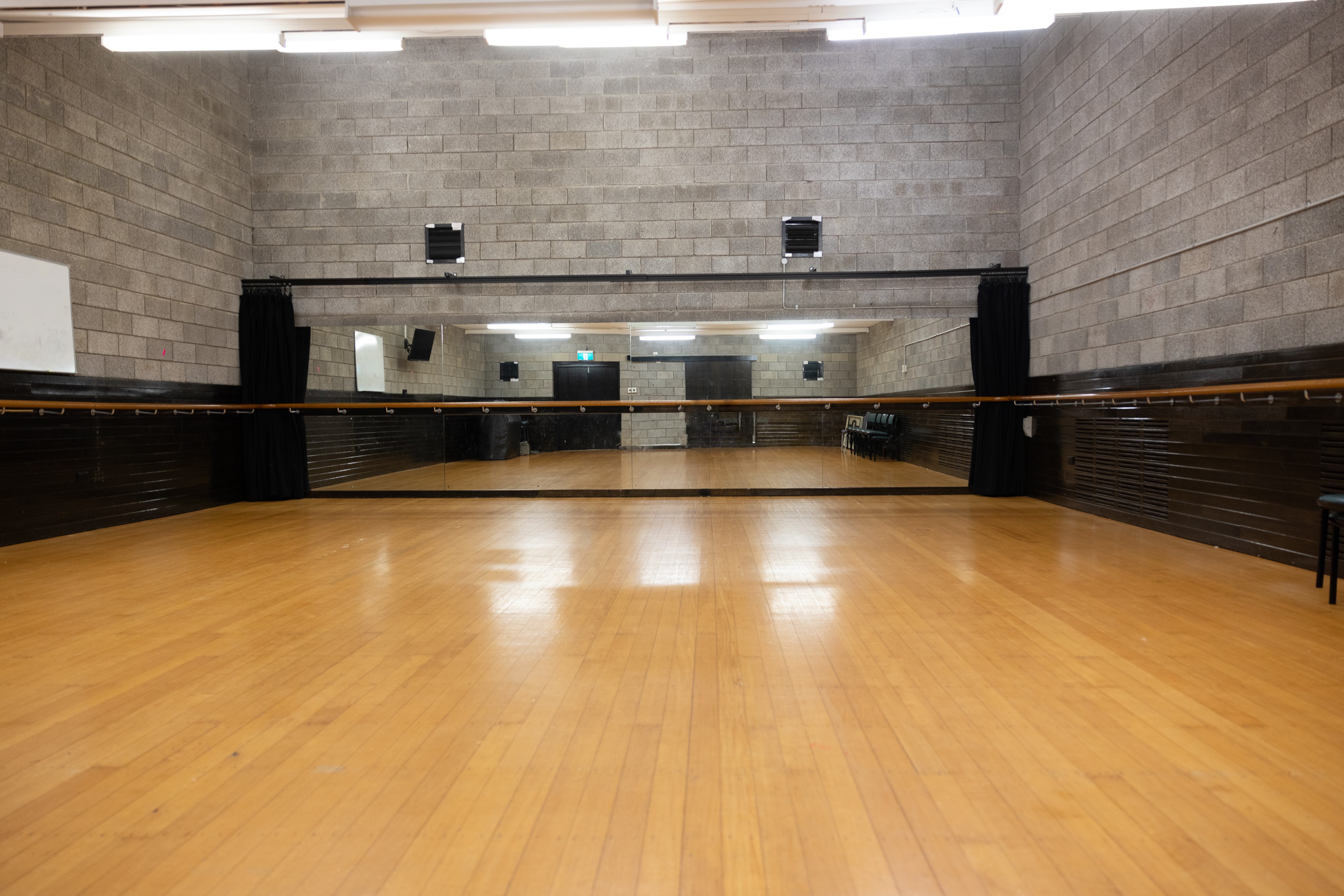 Seymour Centre rehearsal image with ballet bars and a mirror. 