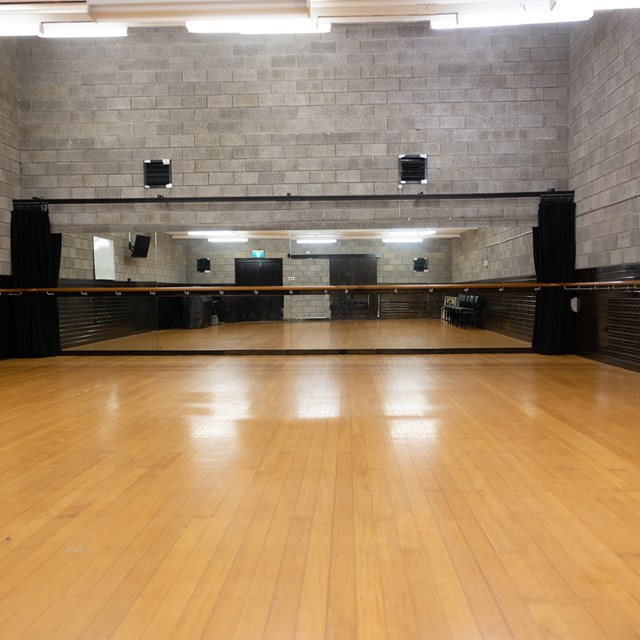 Seymour Centre rehearsal image with ballet bars and a mirror.